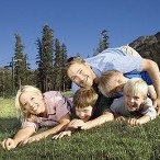 Family Laying on Grass